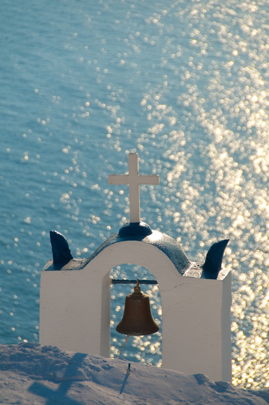 Greek Church In Santorini Greece With A Cross